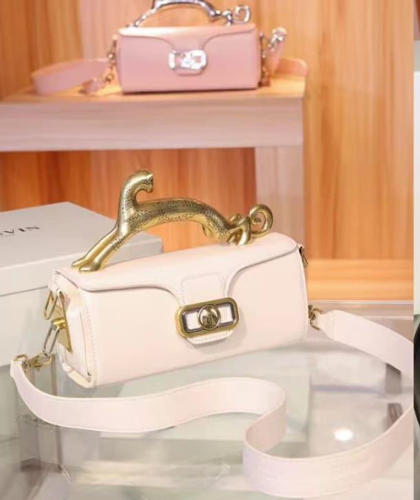 Pencil cat leather bag