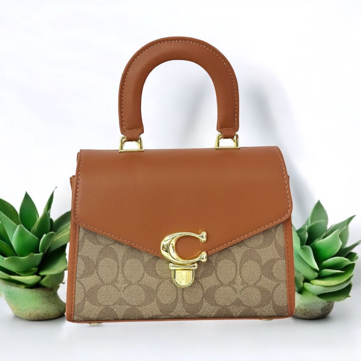 Top handle designer purse