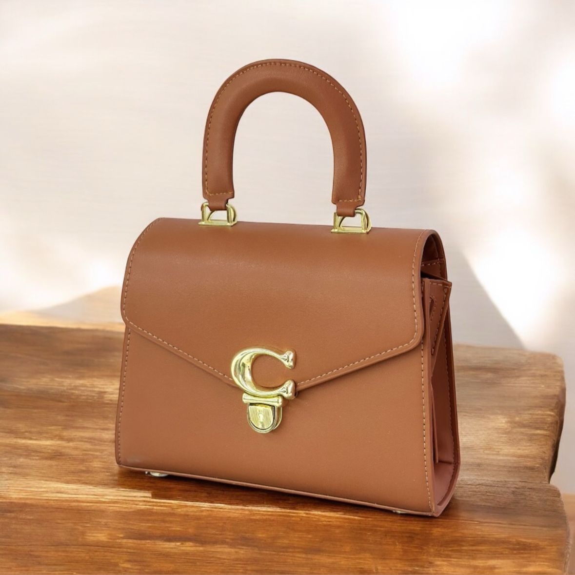 Top handle designer purse